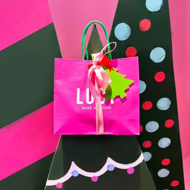 LUCY pink bag with ribbon and tag